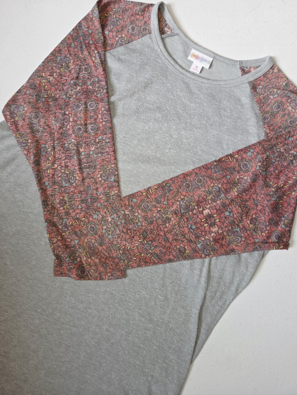 NWT LuLaRoe Randy Raglan Tee Heather Gray Pink Floral Multi Pattern Sleeves M